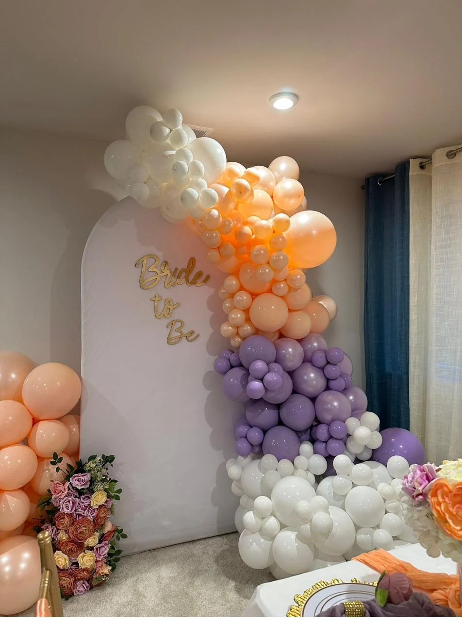 Elegant pastel balloon arch by IC Grace Events